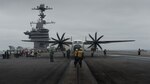 PACIFIC OCEAN (June 19, 2018) An E-2C Hawkeye assigned to the "Liberty Bells" of Carrier Airborne Early Warning Squadron (VAW) 115, of Carrier Air Wing (CVW) 11, prepares to take off from the flight deck of the Nimitz-class aircraft carrier USS John C. Stennis (CVN 74). CVW 11 is conducting carrier qualifications aboard John C. Stennis. John C. Stennis is underway preparing for its next scheduled deployment.