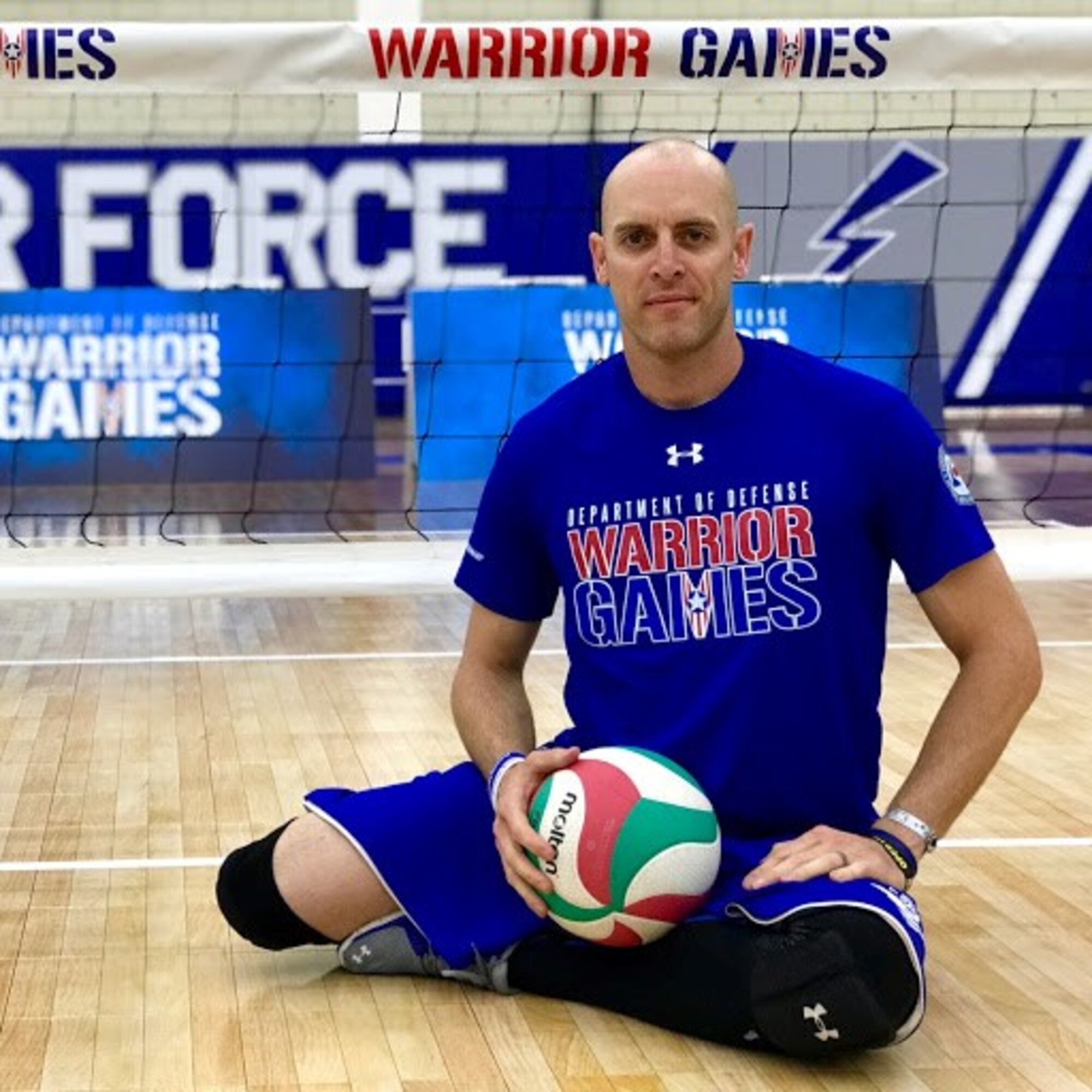 AFOSI Special Agent Bill Lickman, Detachment 223, Tyndall, Air Force Base, Fla., pauses during a break in the sitting volleyball competition at the Department of Defense Warrior Games held at the United States Air Force Academy, Colo., in June 2018. (Photo by AFW2)