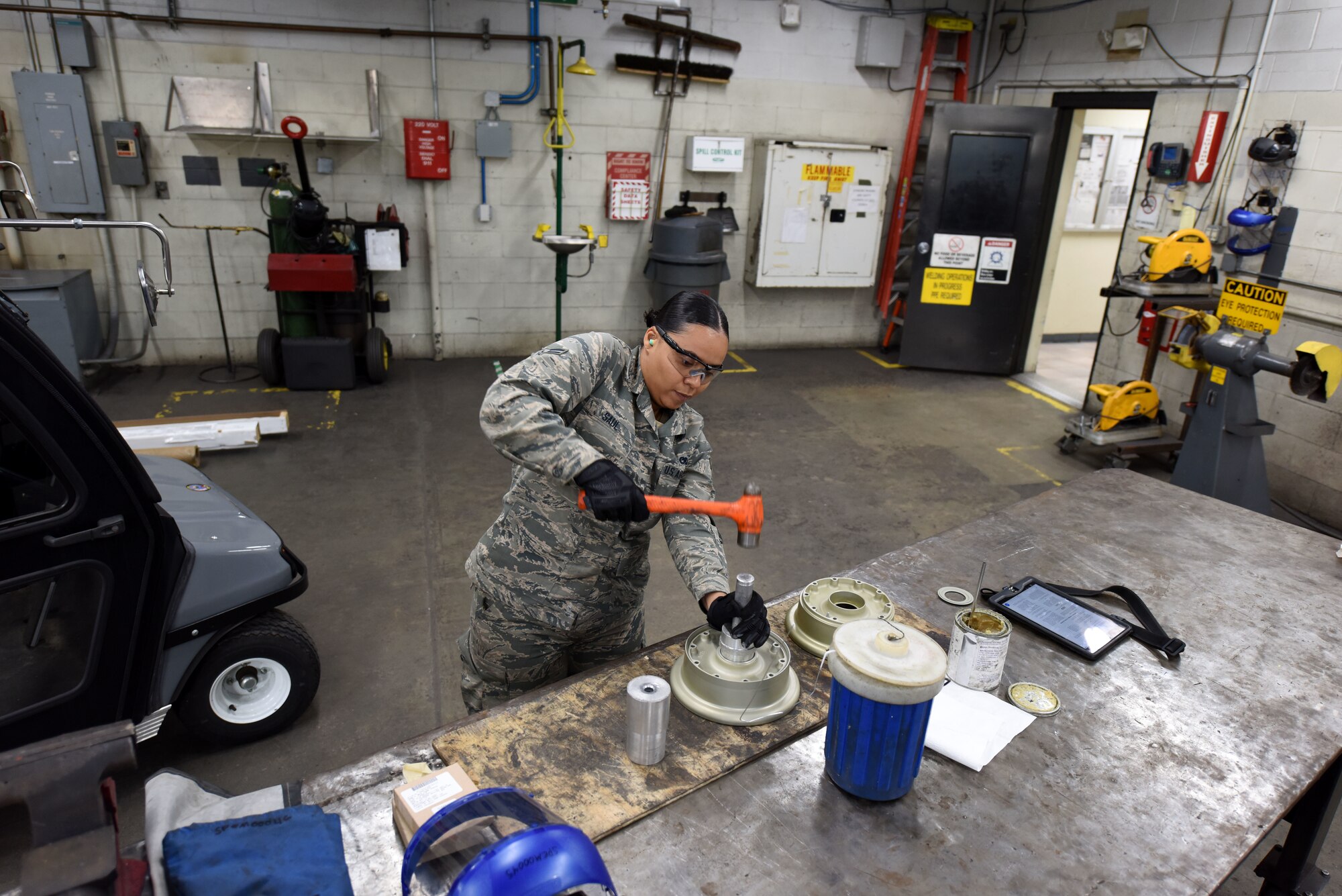 U.S. Air Force Airman 1st Class Sondra Saul, 20th Equipment Maintenance Squadron aircraft metals technician apprentice, hammers a bearing cup inside a wheel bearing in the metal shop at Shaw Air Force Base, S.C., Nov. 30, 2018.