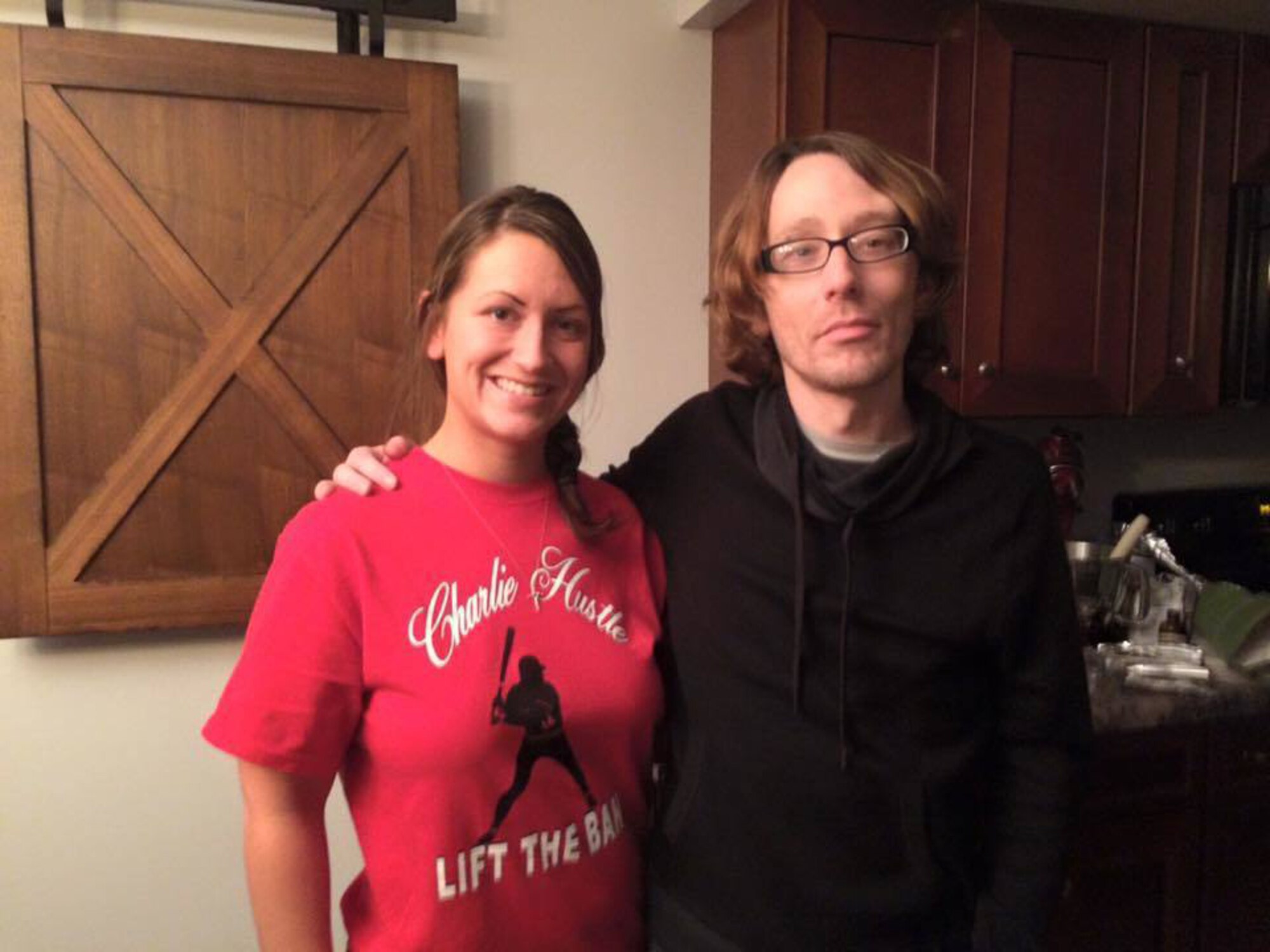 Alicia Stayonovich smiles for a photo with her brother, Travis Sparrow, in their parents’ home in Wapakoneta, Ohio. Now a staff sergeant in the Ohio Air National Guard, Stoyanovich works as a criminal analyst for the Ohio Counterdrug Task Force, a job she takes personally as her brother fought drug addiction for several years before ultimately suffering a fatal heroin overdose in 2015.