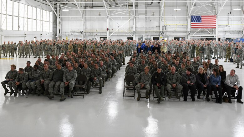 Members of the 910th Airlift Wing watch a video during the holiday commander’s call in Hangar 305 at Youngstown Air Reserve Station, Dec. 1, 2018.