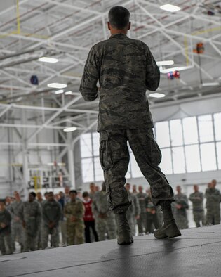 Col. Dan Sarachene, 910th Airlift Wing commander, speaks to 910th Airlift Wing members during the holiday commander’s call in Hangar 305 at Youngstown Reserve Station, Dec. 1, 2018.