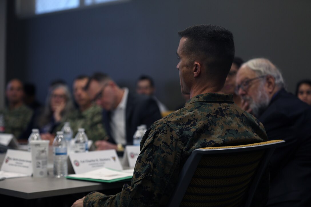 Col. Charles Dockery, commanding officer of Marine Corps Air Station Miramar, discusses how MCAS Miramar is leading the charge in energy conservation with members of the California Public Utilities Commision at MCAS Miramar, Calif., Dec. 3. The members of the California Public Utilities Commision toured MCAS Miramar’s energy operations center, the micro grid, current energy conservation projects, the flight line and the Miramar landfill, which provides renewable power for the base. (U.S. Marine Corps photo by Sgt. Jake McClung)