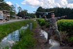 Army Pfc. Michael Makowski, with the South Carolina Army National Guard's D Company, 1st Battalion, 118th Infantry Regiment, launches an RQ-11B Raven in Bucksport, South Carolina, during Hurricane Florence response operations, Sept. 26, 2018. The unmanned aircraft system assists Army Guard units in gathering situational awareness of disaster scenes and sharing that information with other Guard elements, emergency officials and first responders.