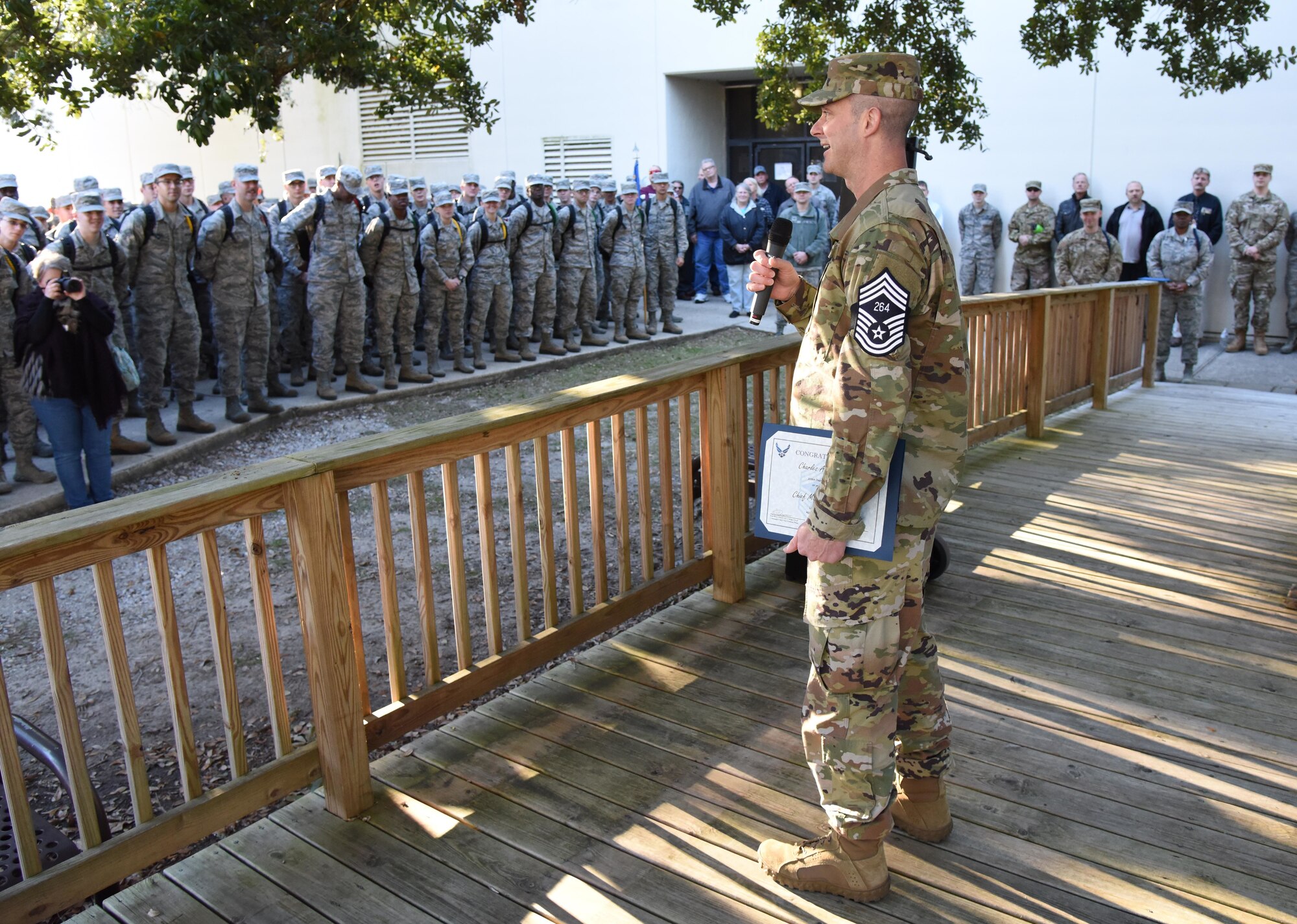 U.S. Air Force Senior Master Sgt. Charles Sargent, 338th Training Squadron flight chief, delivers remarks to technical training students upon the notification of his promotion to the rank of chief master sergeant at Keesler Air Force Base, Mississippi, Dec. 4, 2018. Five senior master sgts. were notified and congratulated for their promotion by the base's leadership and chiefs. (U.S. Air Force photo by Kemberly Groue)