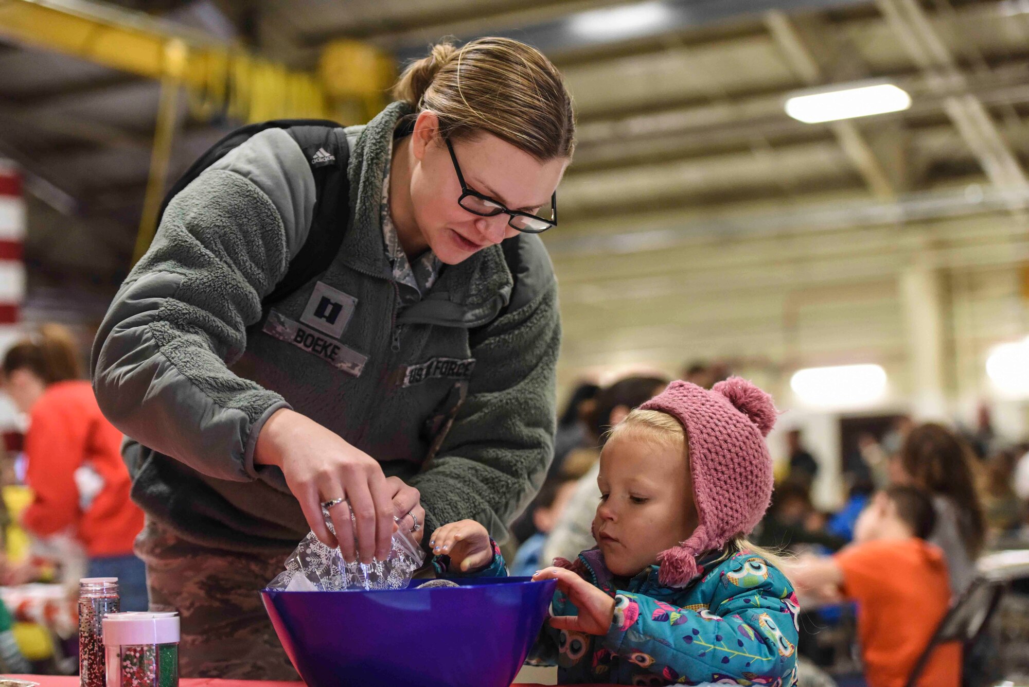 Capt. Danielle Boeke, 419th Operations Support Flight executive officer, makes “reindeer food” with her daughter, Brielle
