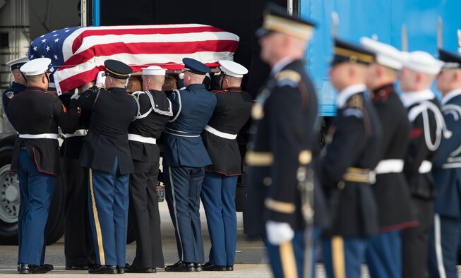 U.S. service members with the Ceremonial Honor Guard carry the casket of George H.W. Bush, the 41st President of the United States, at Joint Base Andrews, Md., Dec. 5, 2018.