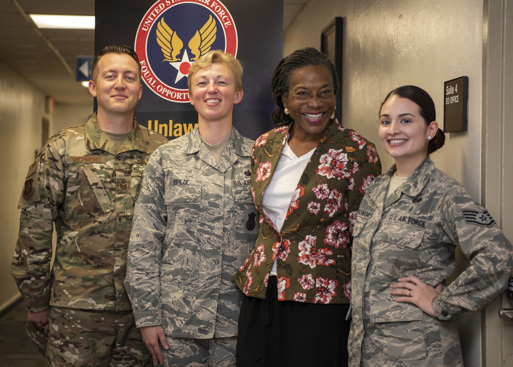 Tech. Sgt. April Spilde, an Equal Opportunity retrainee canidate (second from left), smiles with members of Vandenberg's EO team Dec. 3, 2018, on Vandenberg Air Force Base, Calif.