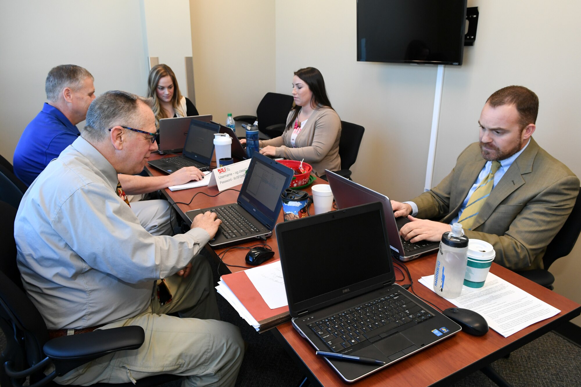 Defense Acquisition University students make use of one of the breakout rooms at its new location in the Falcon Hill complex Dec.4, 2018, at Hill Air Force Base, Utah. The new location will nearly double student capacity to 126 with four classrooms from its previous location. DAU is a corporate university of the Department of Defense offering acquisition, technology, and logistics training to military and federal civilians. (U.S. Air Force photo by Cynthia Griggs)
