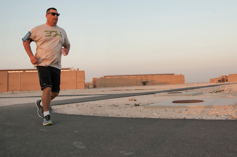 Chaplain (Maj.) Jack Miller, 379th Air Expeditionary Wing chaplain, runs the Blatchford-Preston Complex perimeter Dec. 6, 2018, at Al Udeid Air Base, Qatar. Miller was diagnosed with adrenal cancer in 2012 and told by doctors that he would never run longer distances again. While deployed at Al Udeid, Miller trained for months and was able to complete the base’s Veterans Day 5K run Nov. 11, 2018. (U.S. Air Force photo by Tech. Sgt. Christopher Hubenthal)