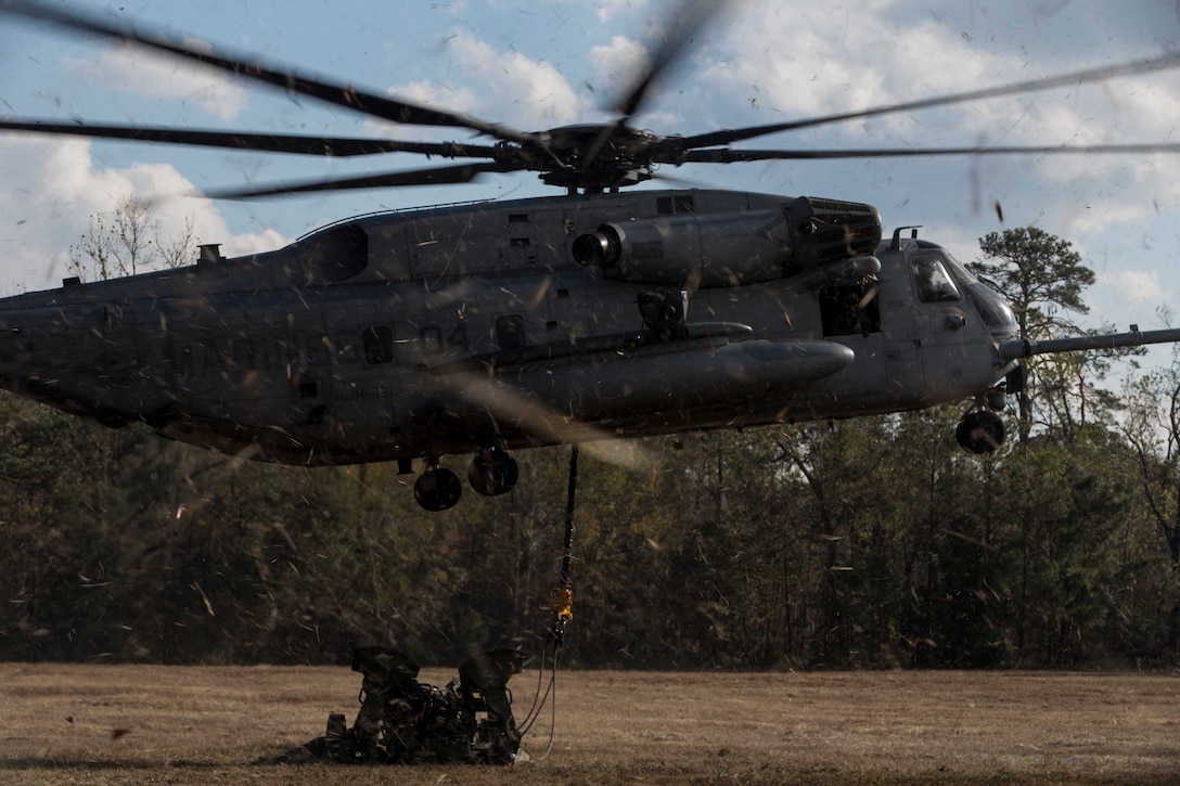 A U.S. Marine Corps CH-53E Super Stallion aircraft assigned to Marine Heavy Helicopter Squadron 451 detaches a M777 Howitzer in support of external lift operations during Exercise Northern Steel on Camp Lejeune, N.C., Dec. 5, 2018. The exercise combines elements of the Marine Air-Ground Task Force to build combined combat power, ensuring maximized readiness for potential global contingencies. (U.S. Marine Corps photo by Cpl. Santino D. Martinez)