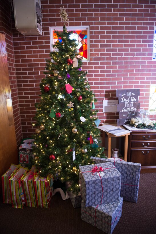Tags stand ready to be taken on an Angel Tree in the Strategic Air Command chapel Dec. 6, 2018, at Offutt Air Force Base, Nebraska. Each year, Team Offutt members pull ornaments from the base chapels with a child’s description and their desired gift, and purchase the gift to be given anonymously. (U.S. Air Force photo by Zachary Hada)