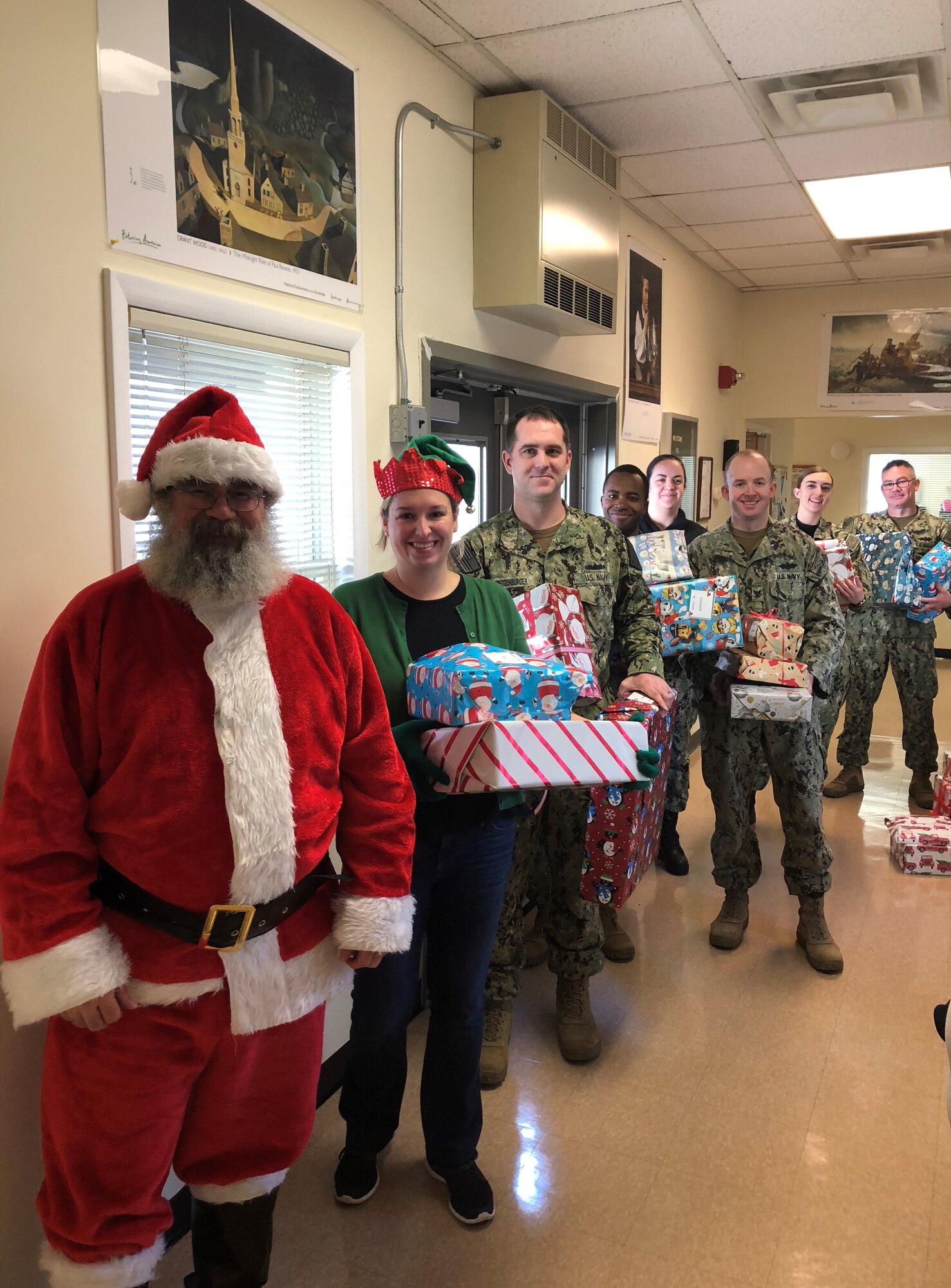 Navy civilians and Sailors from the Lakehurst side of Joint Base McGuire-Dix-Lakehurst donated more than 200 toys to local Head Start children as part of the 43rd annual Navy Lakehurst Giving Tree. Here, Santa and his elves visit the Manchester, New Jersey Head Start location. (Photo courtesy of O.C.E.A.N., Inc. Head Start)