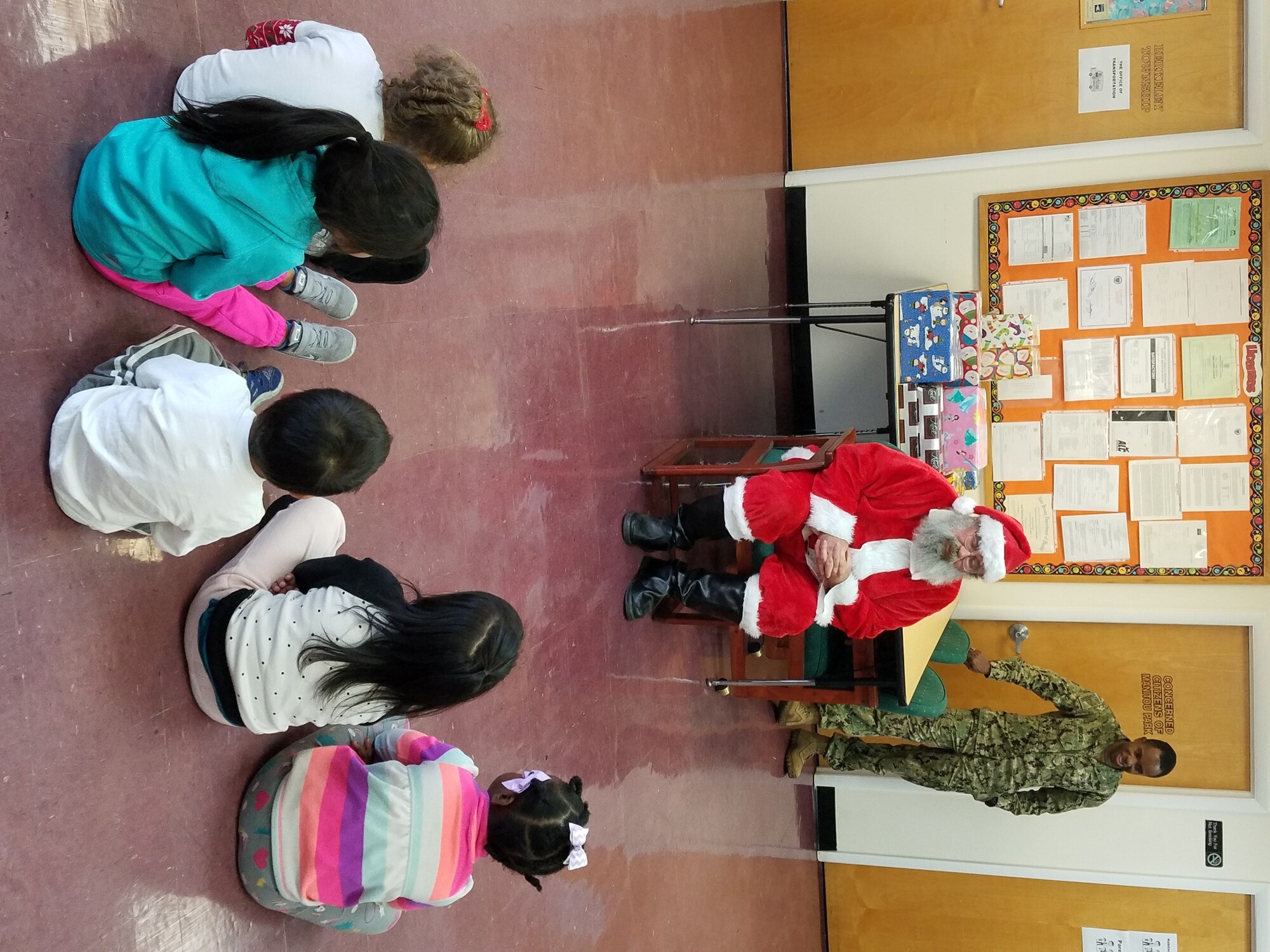 Navy civilians and Sailors from the Lakehurst side of Joint Base McGuire-Dix-Lakehurst donated more than 200 toys to local Head Start children as part of the 43rd annual Navy Lakehurst Giving Tree. Here, Santa visits the Berkeley, New Jersey Head Start location. (U.S. Navy photo)