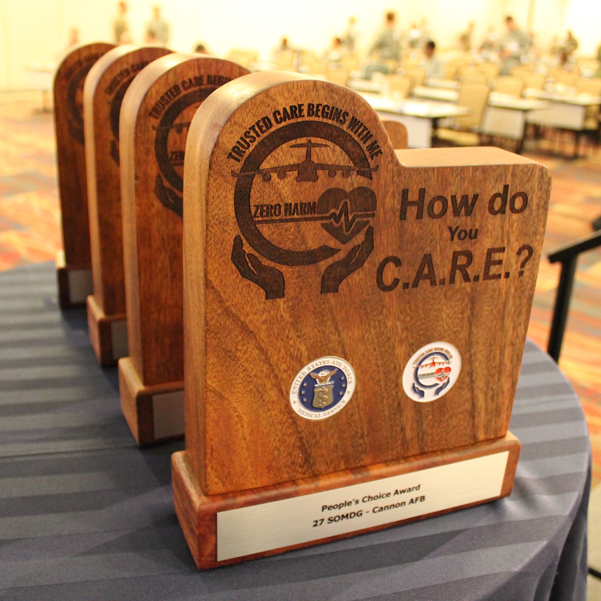 U.S Air Force Airmen from Cannon Air Force Base, New Mexico, Fairchild Air Force Base, Washington, Offutt Air Force Base, Nebraska, and Al Dhafra Air Base, United Arab Emirates, received awards as part of the Trusted Care “How Do You C.A.R.E.” campaign, during the 2018 Air Force Medical Service Senior Leadership Workshop at the National Conference Center in Leesburg, Va., Dec. 5, 2018. (U.S. Air Force photo by Josh Mahler)