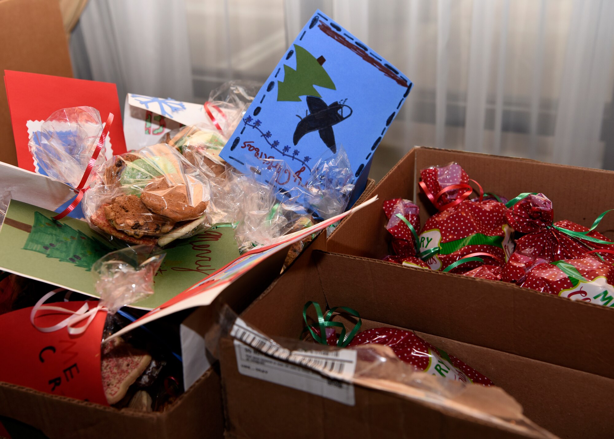 Cookies packaged by volunteers during the Airmen Cookie Drive wait to be picked up and passed out by First Sergeants, Dec. 6, 2018, at Luke Air Force Base, Ariz.