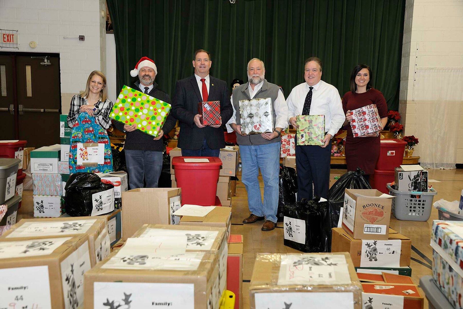 Senior leaders and campaign coordinators take a moment to reflect on the generosity that provided the hundreds of items donated to support local families in need. Shown from left to right are and LeAnn Gaviglio, delivery and volunteer coordinator; Don Phillips, DLA Installation Support at Battle Creek site director; Kevin Faber, local DLA Information Operations “mayor;” Ray Zingaretti, Logistics Information Services director and Elli Blonde, who coordinated the collection efforts among the local Defense Logistics Agency activities.