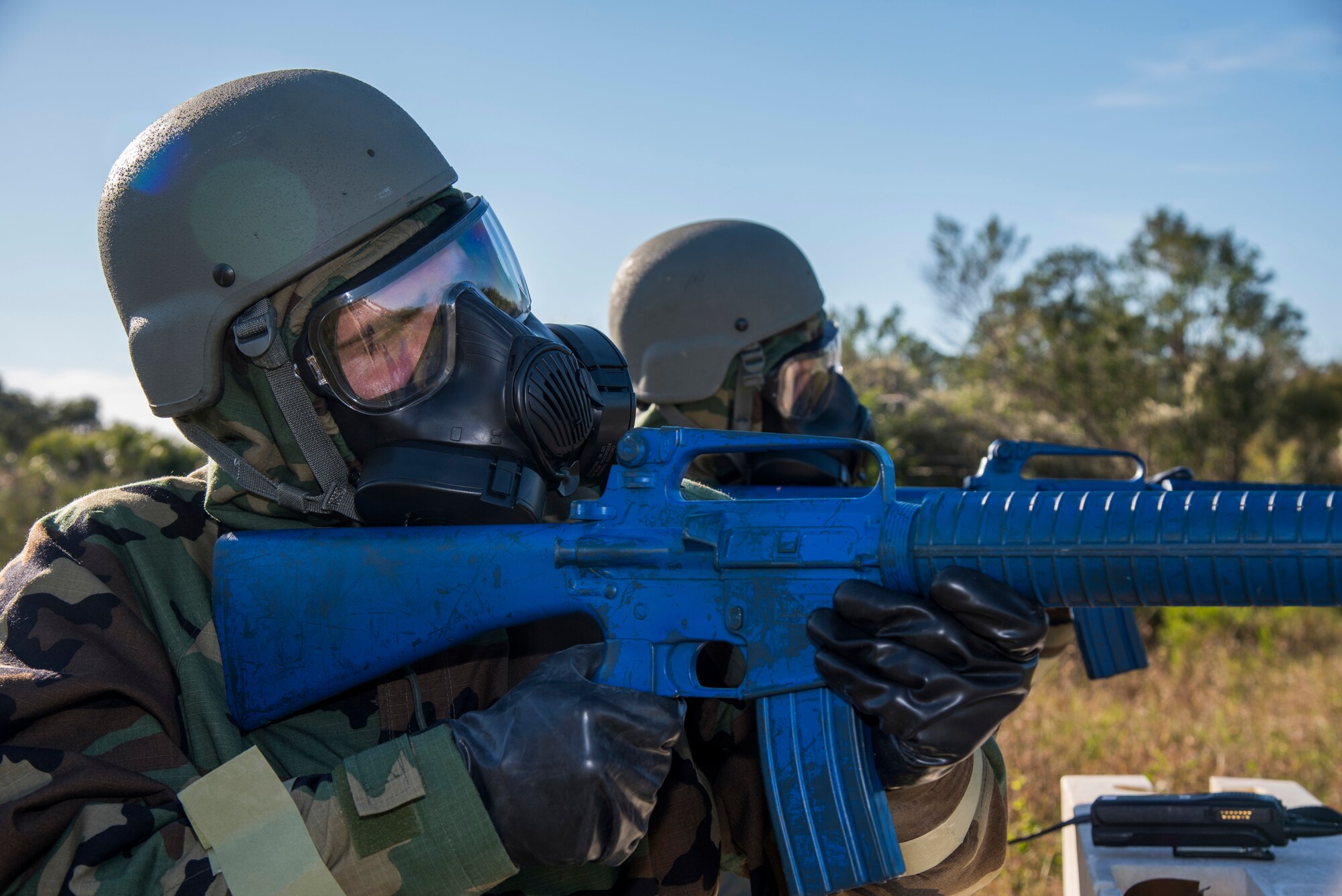 U.S. Air Force Airman Zackary Gustafson, 6th Logistics Readiness Squadron fuels distribution apprentice
and Senior Airman Andrew Cary, a contracting specialist assigned to the 6th Contracting Squadron, scan
their area of responsibility for threats during an Ability to Survive and Operate training exercise at
MacDill, Air Force Base, Fla., Dec. 6, 2018. The Airmen are occupying a defensive position to protect
simulated vital assets from enemy attack.