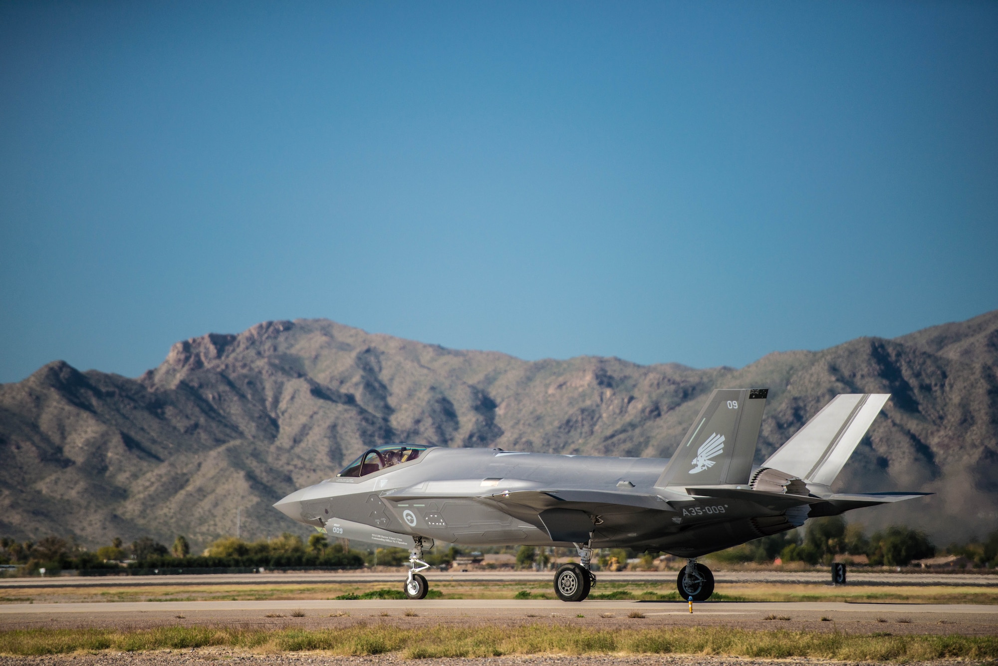 A Royal Australian Air Force F-35A Lightning II taxis at Luke Air Force Base, Ariz., Dec. 3, 2018. Two F-35s were preparing to take off and fly to Hawaii as part of their multi-day journey to Australia. (U.S. Air Force photo by Staff Sgt. Jensen Stidham)