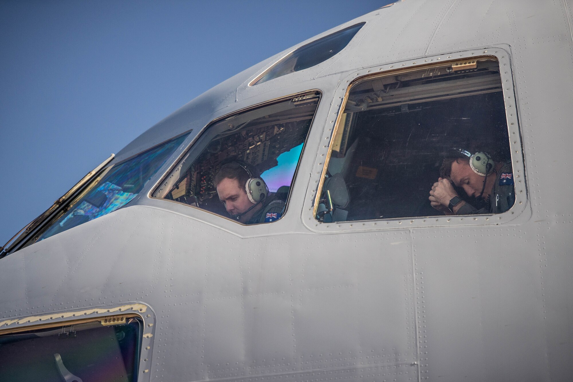 Royal Australian Air Force airman prepare to take off in a C-17 Globemaster III at Luke Air Force Base, Ariz., Dec. 3, 2018. The RAAF airmen were flying in support of a multi-day mission to bring the first two F-35s to Australia. (U.S. Air Force photo by Staff Sgt. Jensen Stidham)