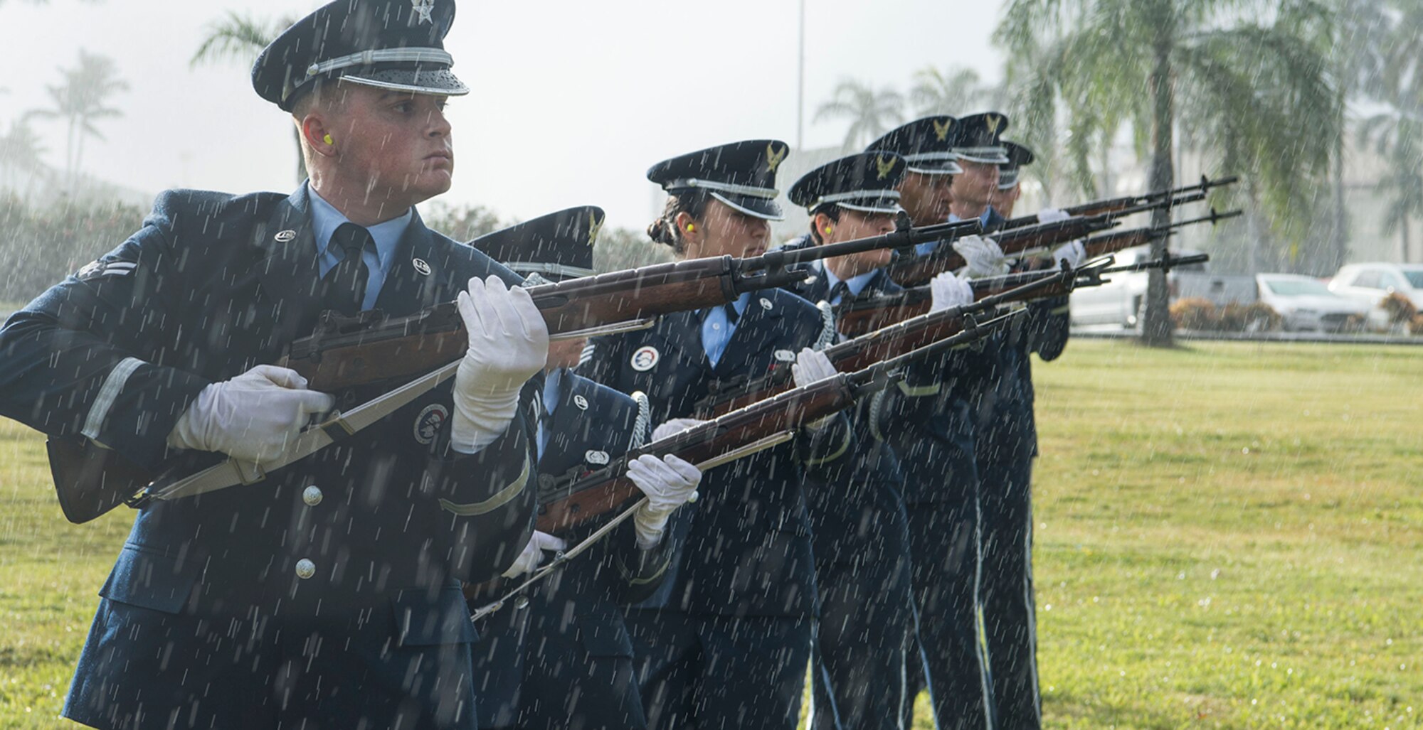 Members of the 15th Wing Honor Guard perform a three volley salute during the Hickam Field Dec. 7th Remembrance Ceremony at Atterbury Circle, Joint Base Pearl Harbor-Hickam, Hawaii, Dec. 7, 2018. The ceremony was held to commemorate the lives and the sacrifices of the men and women who were present during the attack on Dec. 7, 1941. (U.S. Air Force photo by Tech. Sgt. Heather Redman)