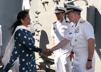 India's Defence Minister Nirmala Sitharaman is greeted by Rear Adm. Brian Fort, Commander, Navy Region Hawaii and Naval Surface Group Middle Pacific, before touring USS Michael Murphy (DDG 112). India and the U.S. are global partners in defense and security and are working together to assure a free and open Indo-Pacific.