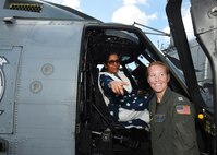 India's Minister of Defence, Nirmala Sitharaman sits inside of one of the Easyriders Helicopter Maritime Strike Squadron Three Seven (HSM-37) helicopters while touring the USS Michael Murphy. India and the U.S. are global partners in defense and security and are working together to assure a free and open Indo-Pacific.