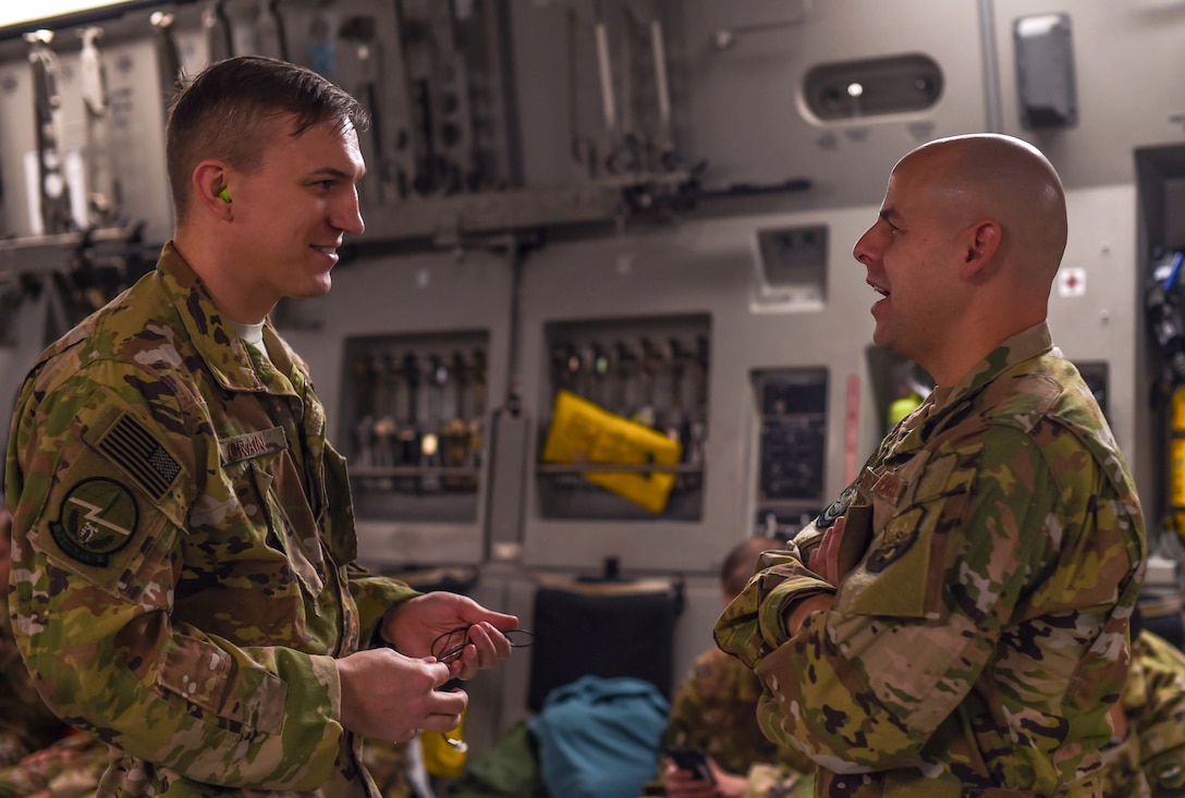 Capt. Jammie Bigbey, 627th Air Base Group chaplain, speaks with Capt. Jade Crain, 7th Airlift Squadron pilot, at Rota Naval Station, Nov. 28, 2018. Bigbey was part of a religious support team who provided assistance to deploying and returning Airmen for a three-month deployment at Ali Al Salem Air Base, Kuwait, and Al Udeid Air Base, Qatar.  (U.S. Air Force photo by Senior Airman Tryphena Mayhugh)