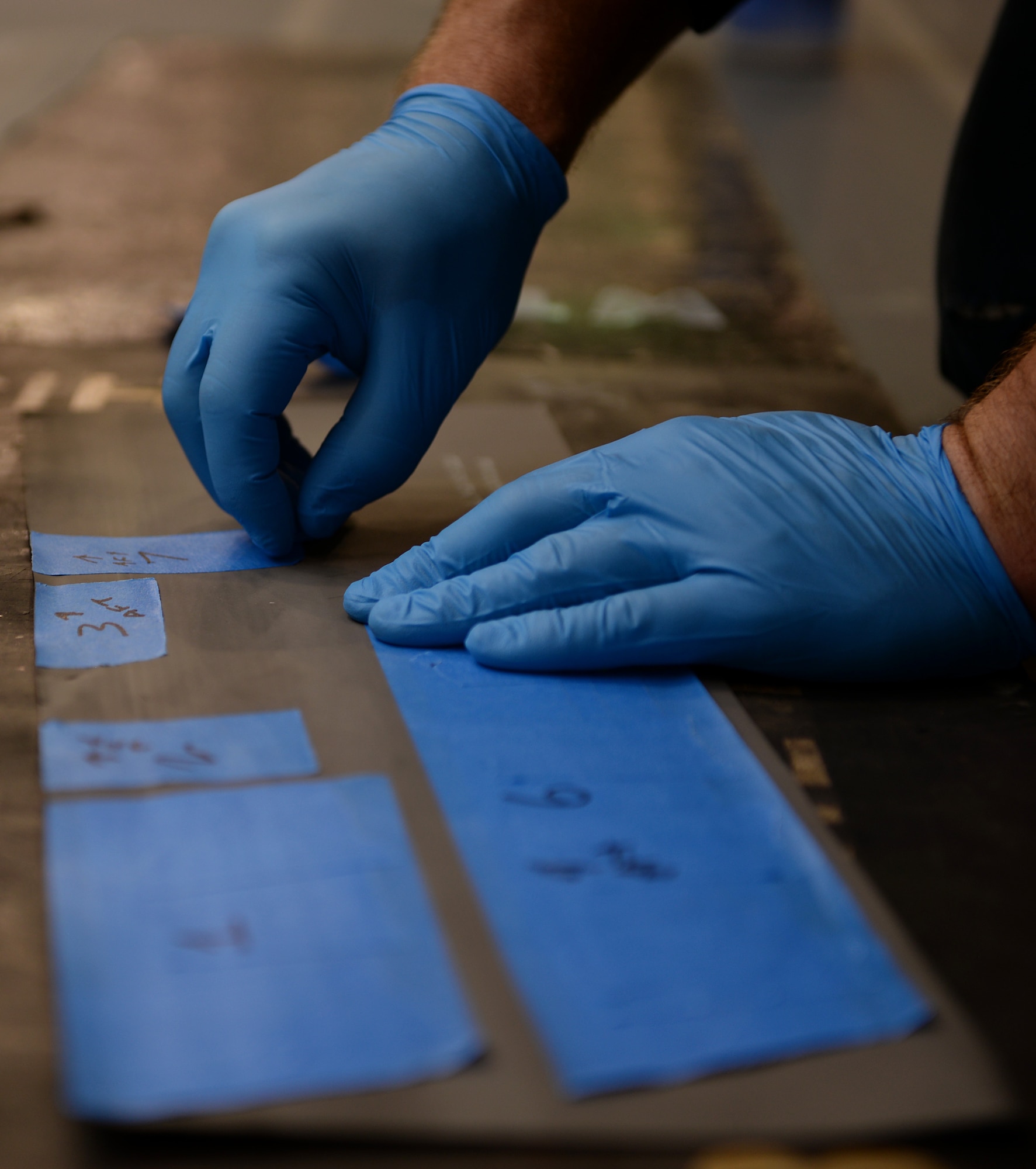 Staff Sgt. Josh Batschke, a low-observable maintenance craftsman assigned to the 131st Maintenance Squadron, Missouri Air National Guard, prepares maintenance labels.
