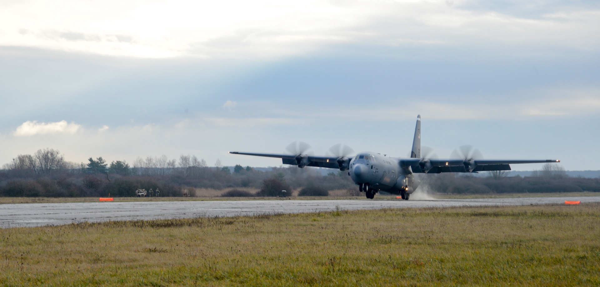 A C-130J Super Hercules aircraft assigned to the 37th Airlift Squadron, 86th Airlift Wing, Ramstein Air Base, Germany, lands on a runway during exercise Contested Forge on Grostenquin Air Base, France, Dec. 4, 2018. Contested Forge is an annual exercise that tests the 435th Contingency Response Group’s ability to build a forward operating base and conduct airfield operations in an austere environment, friendly or hostile. (U.S. Air Force photo by Staff Sgt. Timothy Moore)
