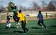 Army 1st  Lt. Deon Evans, U.S. Transportation Command J1 executive officer, catches a football during USTRANSCOM’s Army vs. Navy football game at Scott Air Force Base, Illinois, Nov. 26, 2018. The Army won the game 44 to 32.