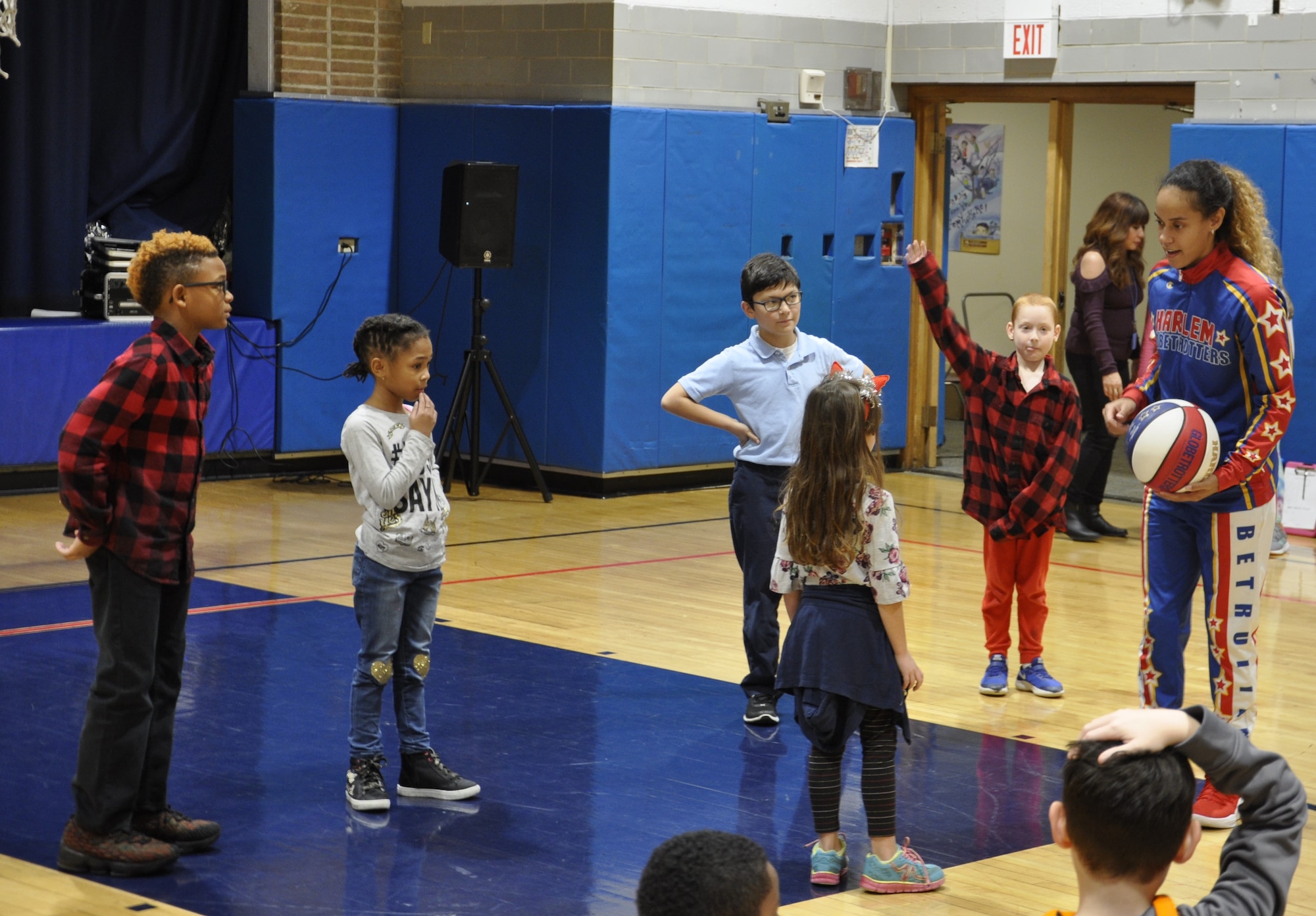Globetrotter "Hoops" Green talks to kids about bullying prevention at the Wright-Patterson Air Force Base Child Development Center.