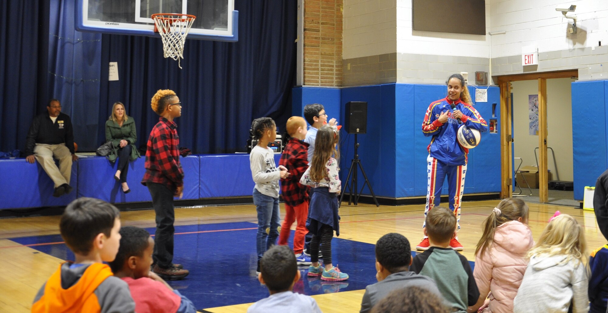 Globetrotter "Hoops" Green talks to kids about bullying prevention at the Wright-Patterson Air Force Base Child Development Center.