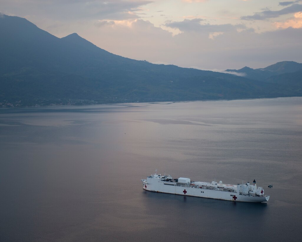 The hospital ship USNS Comfort (T-AH 20) is anchored off the coast of Honduras as part of an 11-week medical support mission to Central and South America as part of U.S. Southern Command’s Enduring Promise initiative.