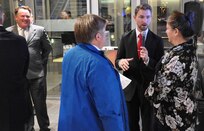 IMAGE: Don Smith from NSWC Federal Credit Union interviews guests at the Dahlgren Centennial Movie Premier.
