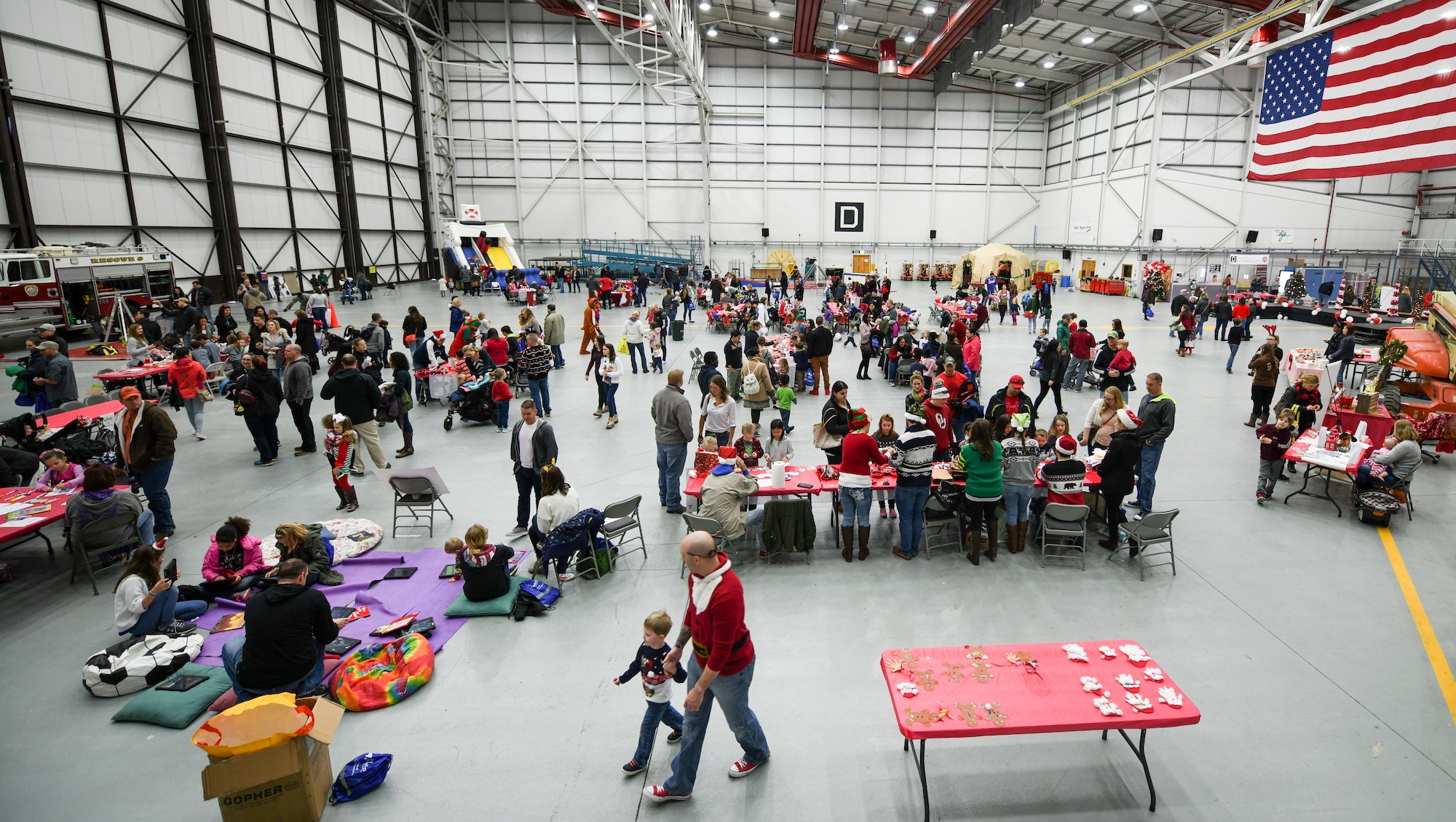Team Mildenhall members participate in activities during the annual Children’s Holiday Party at RAF Mildenhall, England, Dec. 8, 2018. The Mildenhall Spouses Association hosted the Hearts Apart event, and the annual Children’s Holiday Party for Team Mildenhall families. (U.S. Air Force photo by Tech. Sgt. Emerson Nuñez)