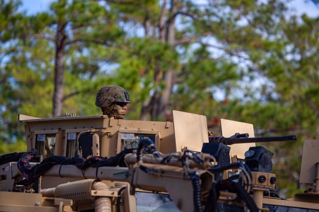 A U.S. Marine with 3rd Battalion, 6th Marine Regiment, 2nd Marine Division, provides security during breaching operations as part of 6th Marine Regiment field exercise (FEX) aboard Camp Lejeune, N.C., Dec. 4, 2018. The regiment FEX utilizes combat capabilities from across the Marine Air-Ground Task Force, enhancing mission readiness.