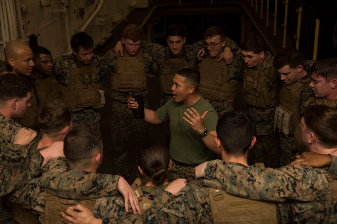 Cpl. Renilo Maglaya, center, a Marine Corps Martial Arts Program (MCMAP) instructor with Combat Logistics Battalion (CLB) 13, 13th Marine Expeditionary Unit (MEU), leads a “ring of fire” exercise during a MCMAP course aboard the San Antonio-class amphibious transport dock USS Anchorage (LPD 23), Dec. 4, 2018. The Anchorage and embarked 13th MEU are deployed to the U.S. 6th Fleet area of operations as a crisis response force in support of regional partners as well as to promote U.S. national security interests in Europe and Africa.