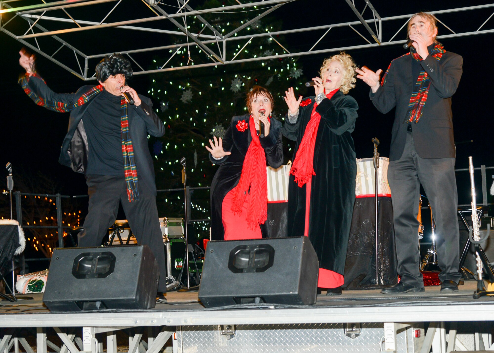 Musical quartet Just Us performs at Winterfest at Edwards Air Force Base, California, Nov. 30. Winterfest is an annual event that allows members of the community to ring in the start of the holiday season. (U.S. Air Force photo by Giancarlo Casem)