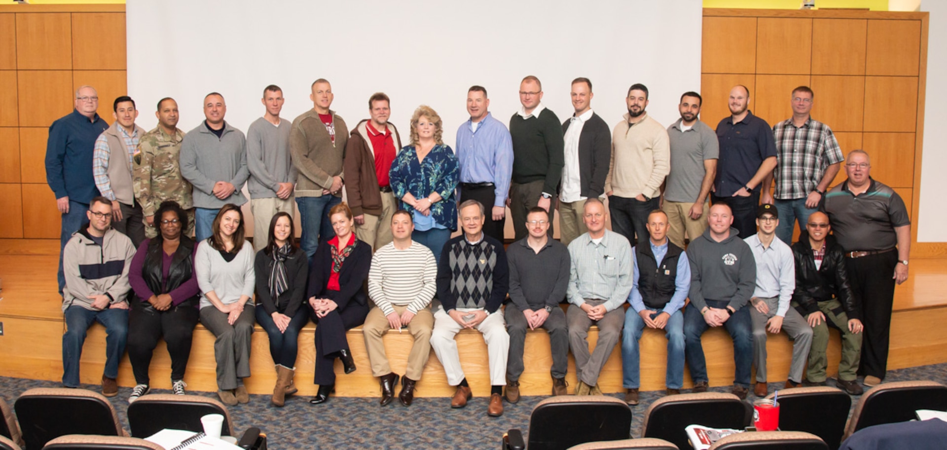 Students of the State Contract Management/Business Manager’s Certification Construction Facilities Maintenance Office (CFMO) 102 course pose for a group photo at Camp Dawson, Kingwood, W.Va., Dec. 6, 2018. Students from around the U.S. participated in the course which provided students a deep-dive into contracting topics such as liability claims, bonding and insurance, contract terminations, contractor claims, delays and remedies, payments and closeout, and ethics.