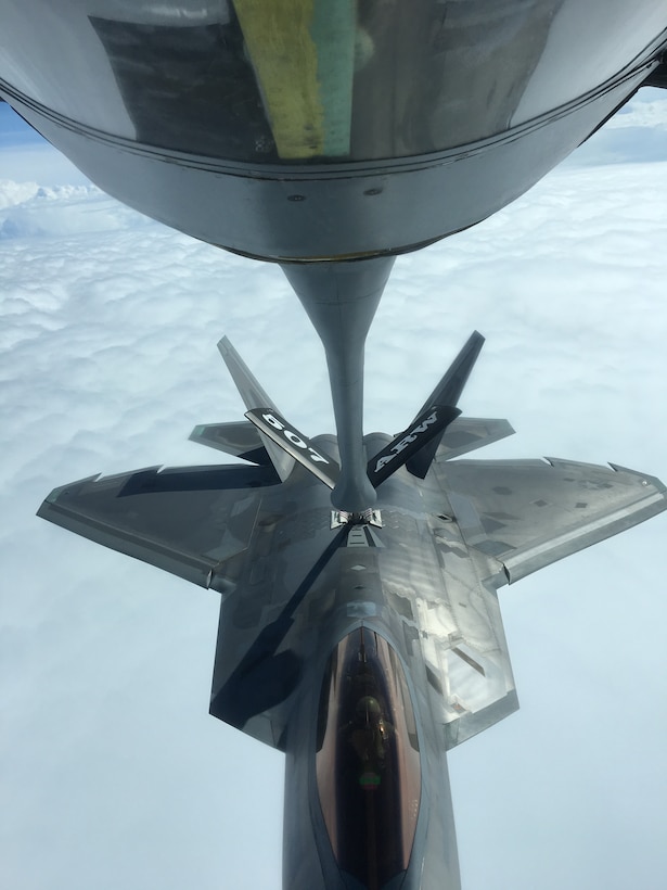 An Air Force Reserve KC-135R Stratotanker crew from the 507th Air Refueling Wing at Tinker Air Force Base, Oklahoma, refuels a U.S. Air Force F-22 Raptor Nov. 5, 2018, from Tyndall Air Force Base, Florida, while en route to Hill Air Force Base, Utah.