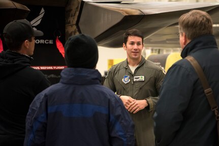 U.S. Air Force Maj. Joshua Gunderson, 3rd Wing chief of advanced programs, gives an F-22 Raptor tour to country singer Granger Smith and his team during their visit to Joint Base Elmendorf-Richardson, Alaska, Nov. 29, 2018. As part of his visit, Smith met with service members, JBER leadership and performed.