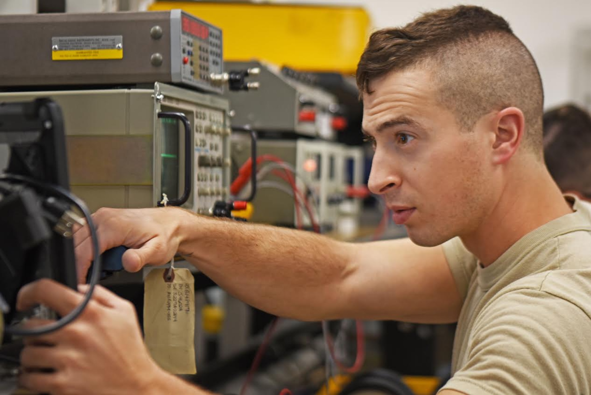 U.S. Air Force Senior Airman Ethan Jones, 20th Component Maintenance Squadron, test measurement diagnostic equipment journeyman checks the frequency measurements at Shaw Air Force Base, S.C., Dec. 7, 2018.