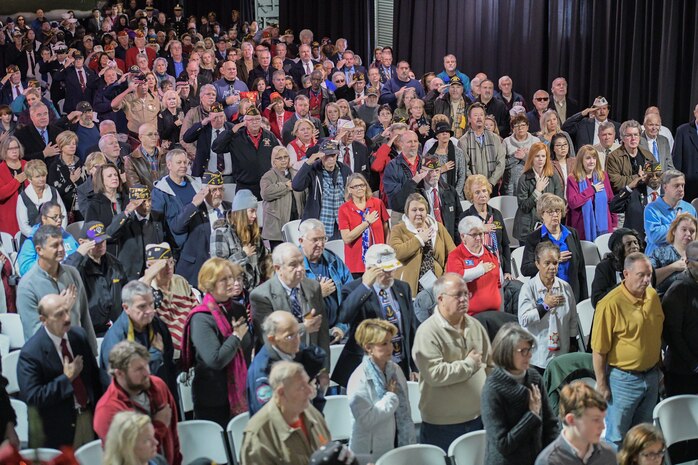 Attendees recite the Pledge of Allegiance during the 77th Pearl Harbor Memorial Day recognition ceremony Dec. 7, 2018, onboard USS Yorktown Naval and Maritime Museum in Mount Pleasant, S.C. Service members and civilians from Joint Base Charleston were among the approximately 200 people attended the event to honor the service and sacrifice of those who died in the Pearl Harbor attacks on Dec. 7, 1941. In all, more than 2,403 U.S. service members and civilians lost their lives, including 25 from South Carolina. The ceremony featured speeches from three veterans present during the attacks on Pearl Harbor, the laying of over 90 wreaths and a 21-gun salute.