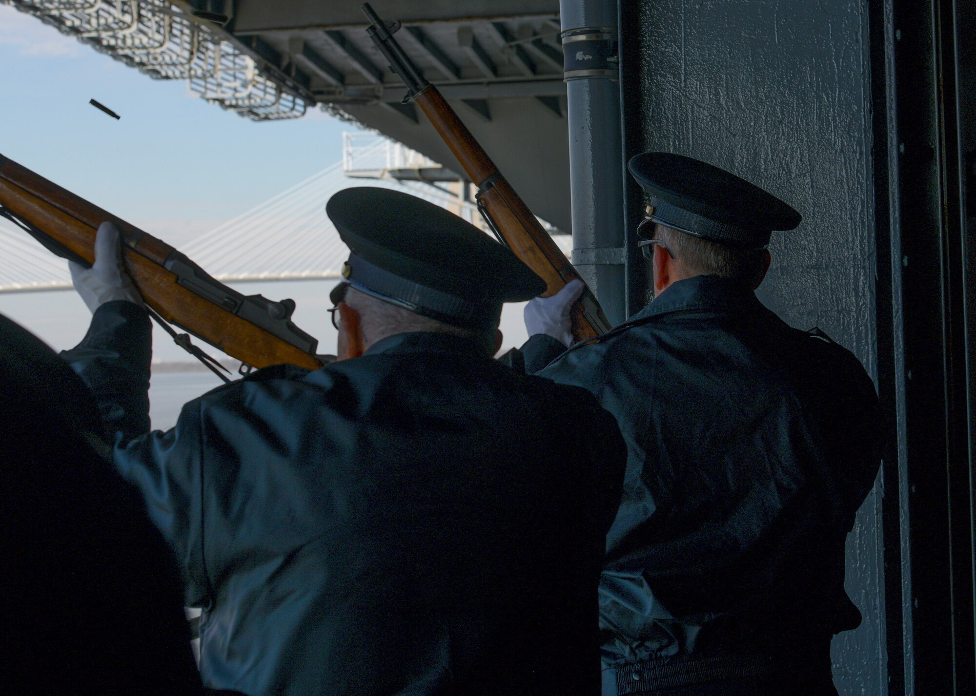 U.S. Navy veterans perform a 21-gun salute during the 77th Pearl Harbor Memorial Day recognition ceremony Dec. 7, 2018, onboard USS Yorktown at Patriot's Point Naval and Maritime Museum in Mount Pleasant, S.C. Service members and civilians from Joint Base Charleston were among the approximately 200 people attended the event to honor the service and sacrifice of those who died in the Pearl Harbor attacks on Dec. 7, 1941. In all, more than 2,403 U.S. service members and civilians lost their lives, including 25 from South Carolina. The ceremony featured speeches from three veterans present during the attacks on Pearl Harbor, the laying of over 90 wreaths and a 21-gun salute.