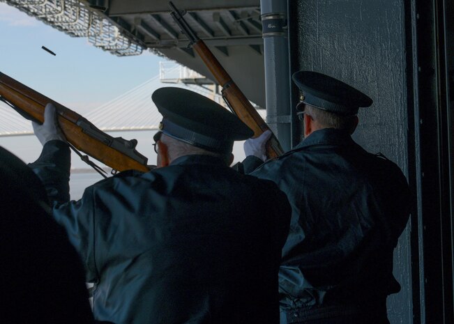 U.S. Navy veterans perform a 21-gun salute during the 77th Pearl Harbor Memorial Day recognition ceremony Dec. 7, 2018, onboard USS Yorktown at Patriot's Point Naval and Maritime Museum in Mount Pleasant, S.C. Service members and civilians from Joint Base Charleston were among the approximately 200 people attended the event to honor the service and sacrifice of those who died in the Pearl Harbor attacks on Dec. 7, 1941. In all, more than 2,403 U.S. service members and civilians lost their lives, including 25 from South Carolina. The ceremony featured speeches from three veterans present during the attacks on Pearl Harbor, the laying of over 90 wreaths and a 21-gun salute.