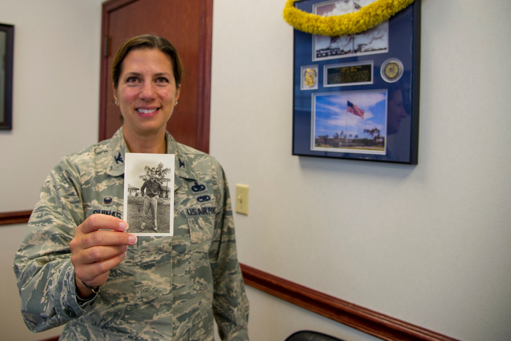 U.S. Air Force Col. Athanasia Shinas, 624th Regional Support Group commander shares the story of her grandfather Ralph Yeager's experience of the Japanese attack on Pearl Harbor at Joint Base Pearl Harbor-Hickam, Hawaii, Dec. 7, 2018. Yeager was stationed in Hawaii in late 1940, and was assigned to the 22nd Material Squadron, 17th Air Base Group, Hickam Field. (U.S. Air Force photo by Master Sgt. Theanne Herrmann)