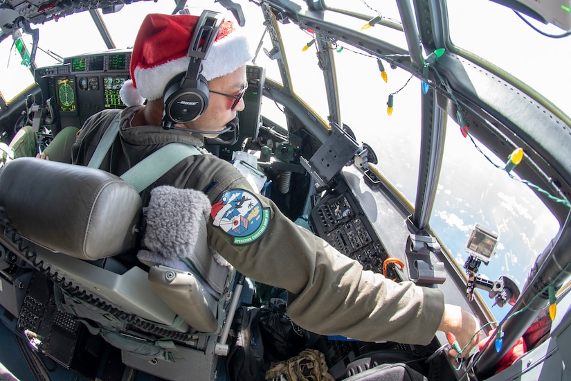 Air Force pilot oversees supply drops during Operation Christmas Drop 2018.