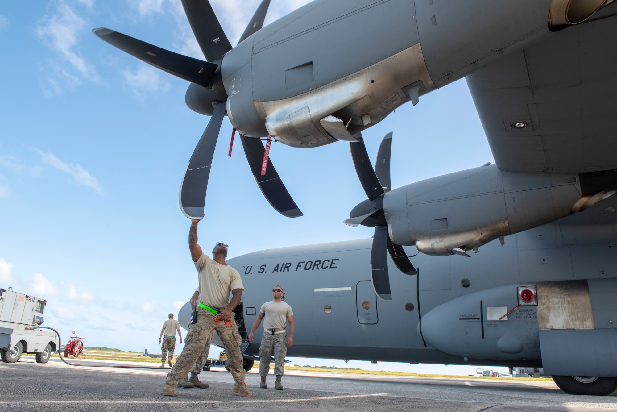 Staff Sgt. Christopher Canto, 374th Aircraft Maintenance Squadron flying crew chief, inspects the propellers of a C-130J Super Hercules during Operation Christmas Drop 2018 at Andersen Air Force Base, Guam, Dec. 9, 2018.