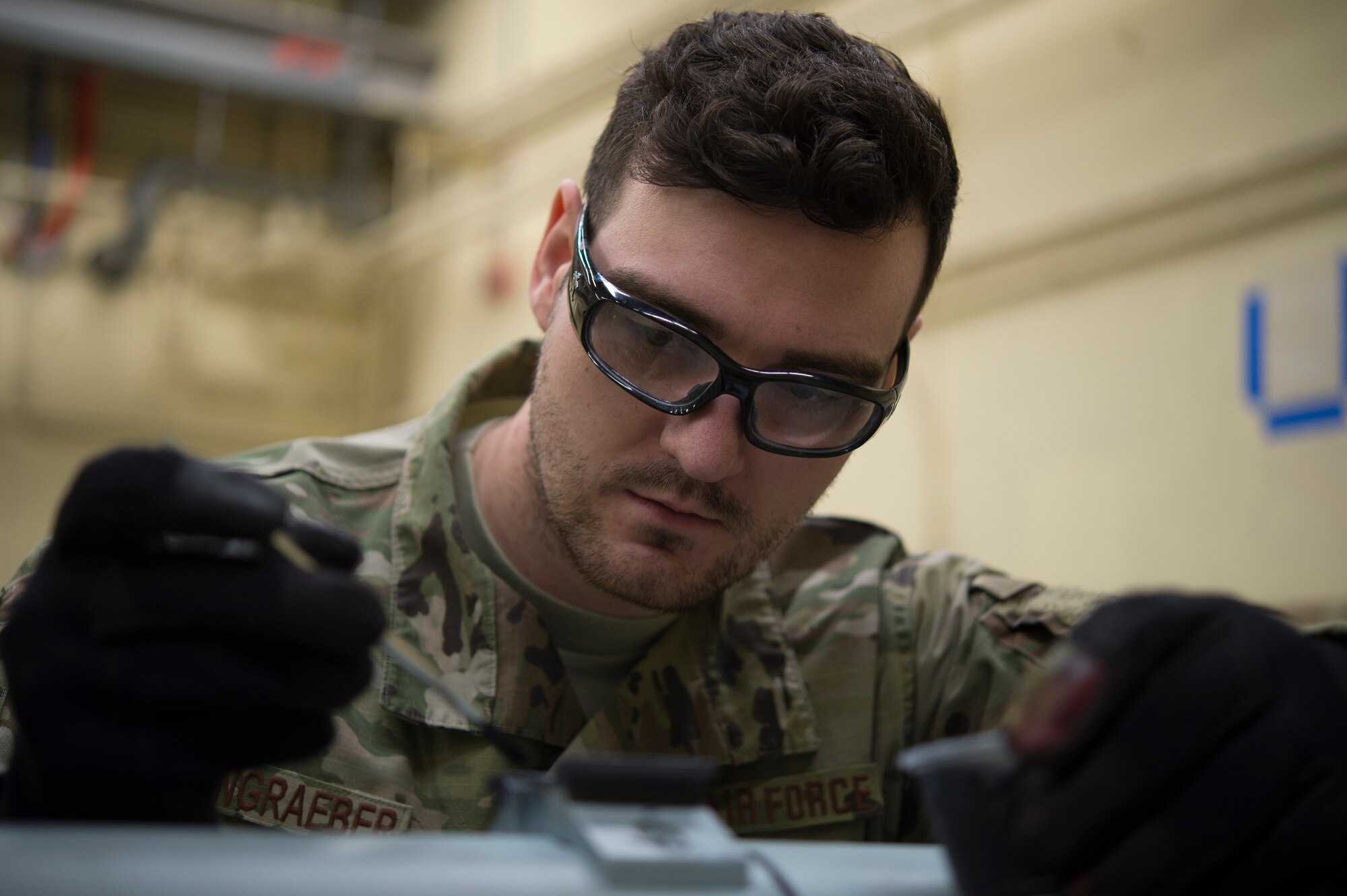 Solid film is applied before the missile is attached to the aircraft to prevent the friction of metal on metal contact